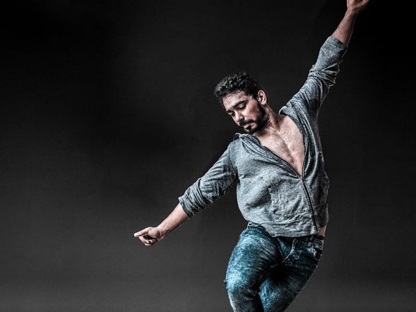 Person in a dynamic but controlled lunge position.